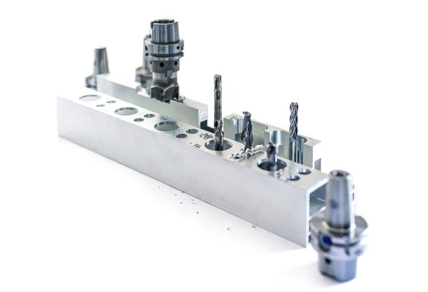 THE SPECIALLY DESIGNED PCD MILLING CUTTER MACHINES BOTH BORES WITH DIFFERENT DIAMETERS